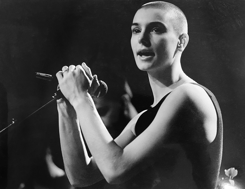 (FILES) An undated photo from the late 1980's shows Sinead O'Connor performing in Vancouver, Canada. I - rish pop singer Sinead O'Connor, who shot to worldwide fame in the 1990s, has died at the age of 56, Irish media reported on July 26, 2023. (Photo by Mandel NGAN / AFP)