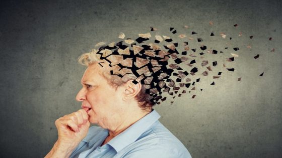 Memory loss due to dementia. Senior woman losing parts of head feeling confused as symbol of decreased mind function.