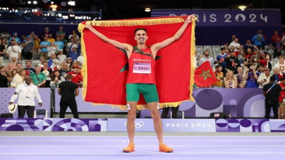 PARIS, FRANCE - AUGUST 07: Soufiane El Bakkali of Team Morocco celebrates winning the gold medal in the Men's 3000m Steeplechase Final on day twelve of the Olympic Games Paris 2024 at Stade de France on August 07, 2024 in Paris, France. (Photo by Christian Petersen/Getty Images)